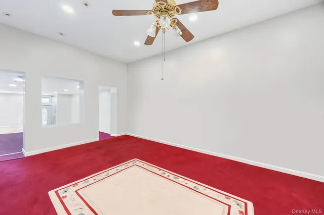 a view of an empty room and window