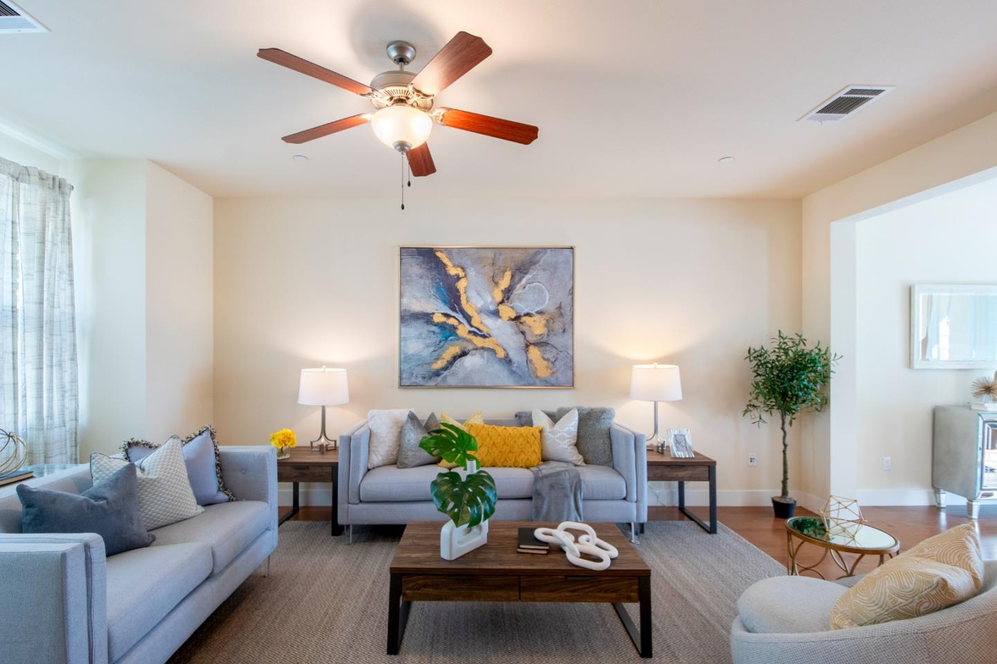 906 Arietta Drive Mountain View, CA 94043 - Photo 1 of 1 a living room with furniture and a potted plant