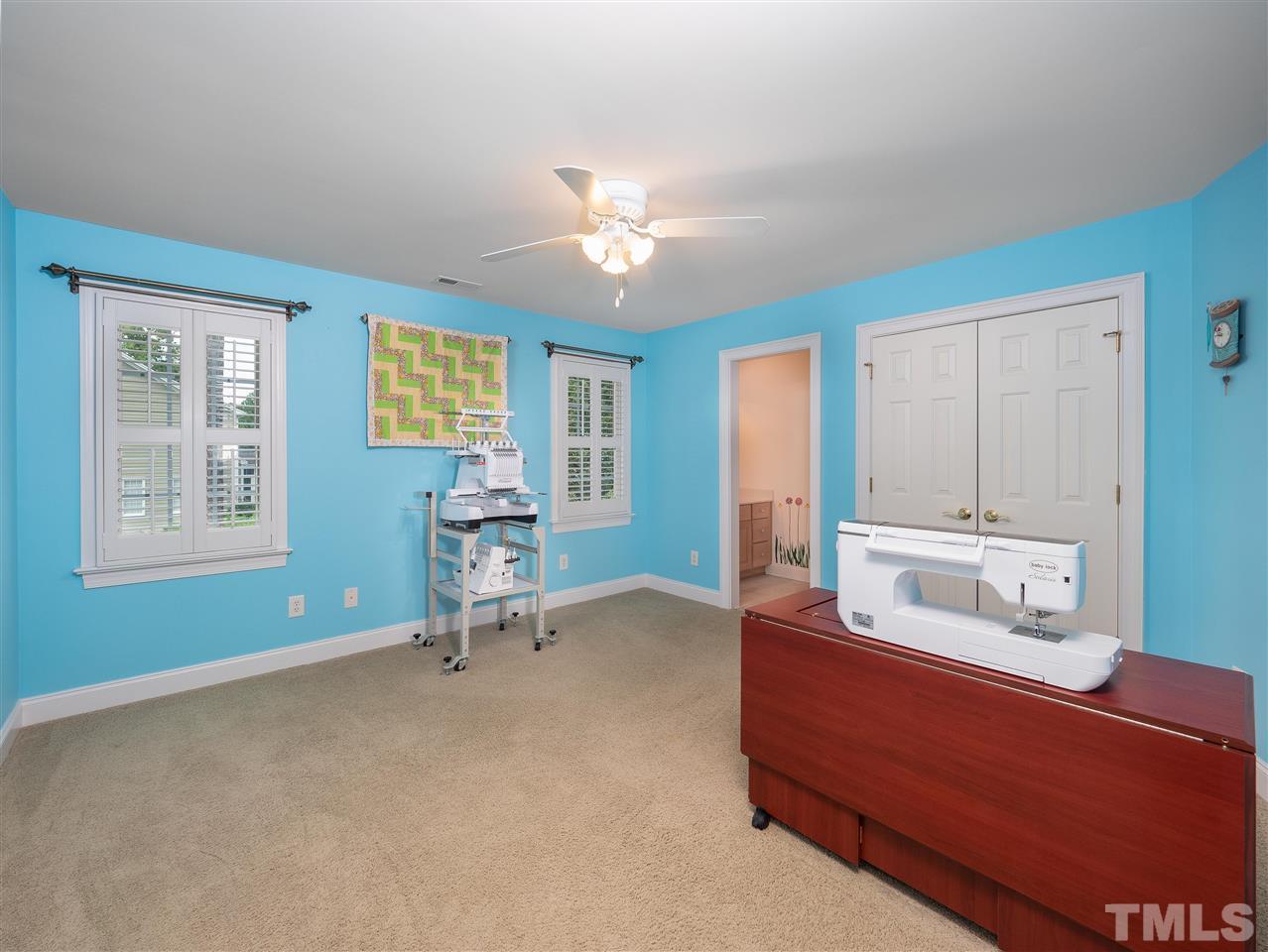2512 Brook Crossing Circle Raleigh, NC 27606 - Photo 19 of 28 a living room with furniture and a window