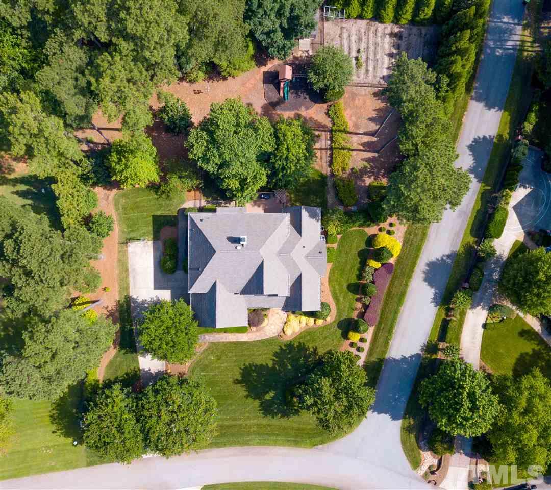 2512 Brook Crossing Circle Raleigh, NC 27606 - Photo 27 of 28 an aerial view of residential houses with outdoor space