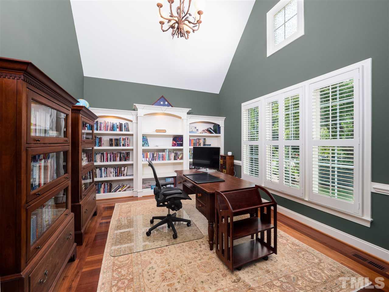 2512 Brook Crossing Circle Raleigh, NC 27606 - Photo 7 of 28 a view of a workspace with furniture and a window