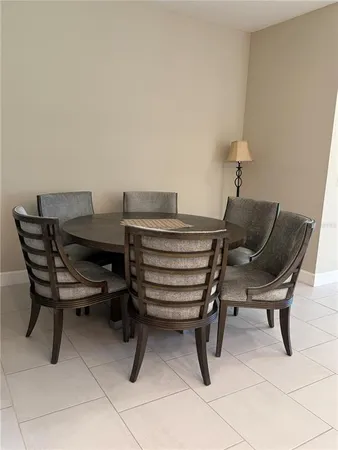 a view of a livingroom with furniture and workspace