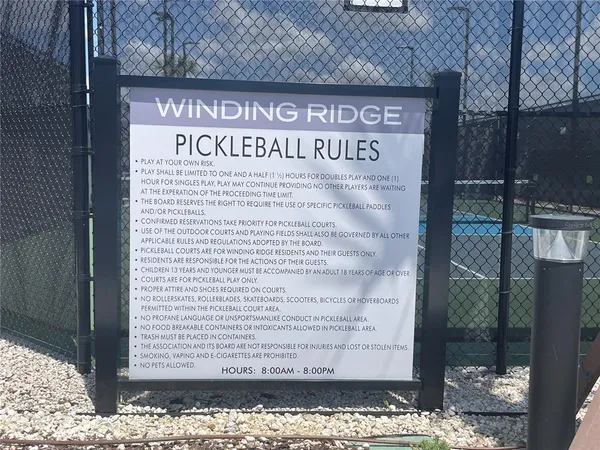a view of a lobby with black carpet