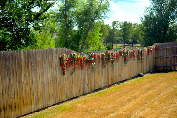 a view of a backyard with a garden