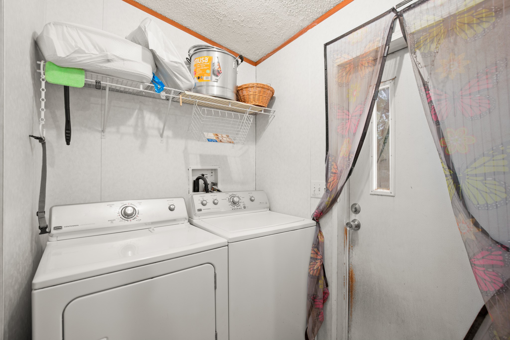 1104 Vasquez Street Austin, TX 78741 - Photo 15 of 18 a utility room with dryer and washer