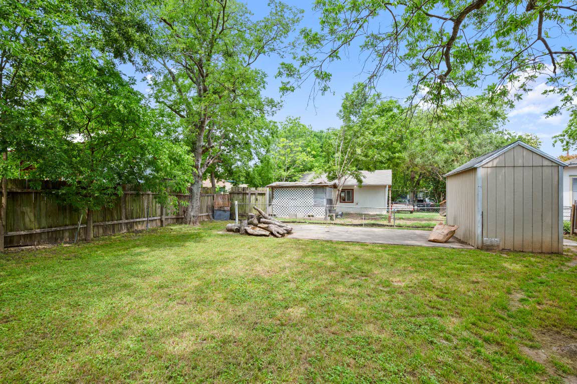 1104 Vasquez Street Austin, TX 78741 - Photo 18 of 18 a backyard of a house with table and sofas