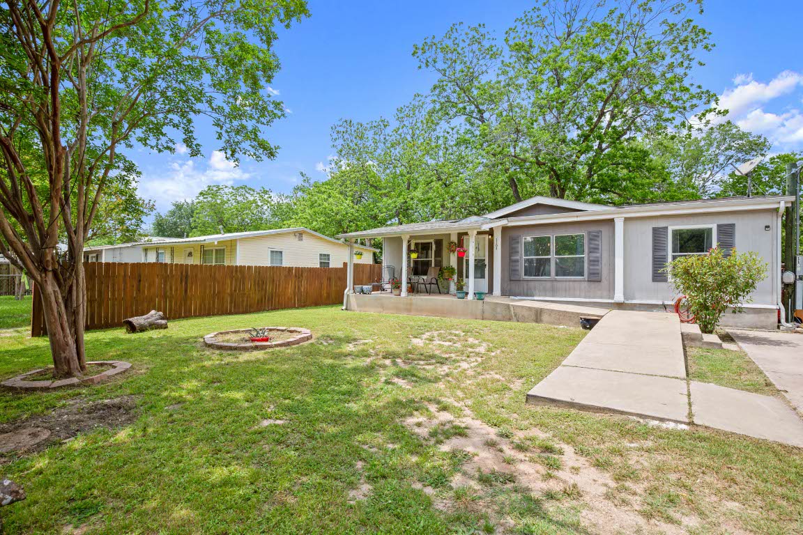 1104 Vasquez Street Austin, TX 78741 - Photo 2 of 18 a view of a house with backyard and sitting area