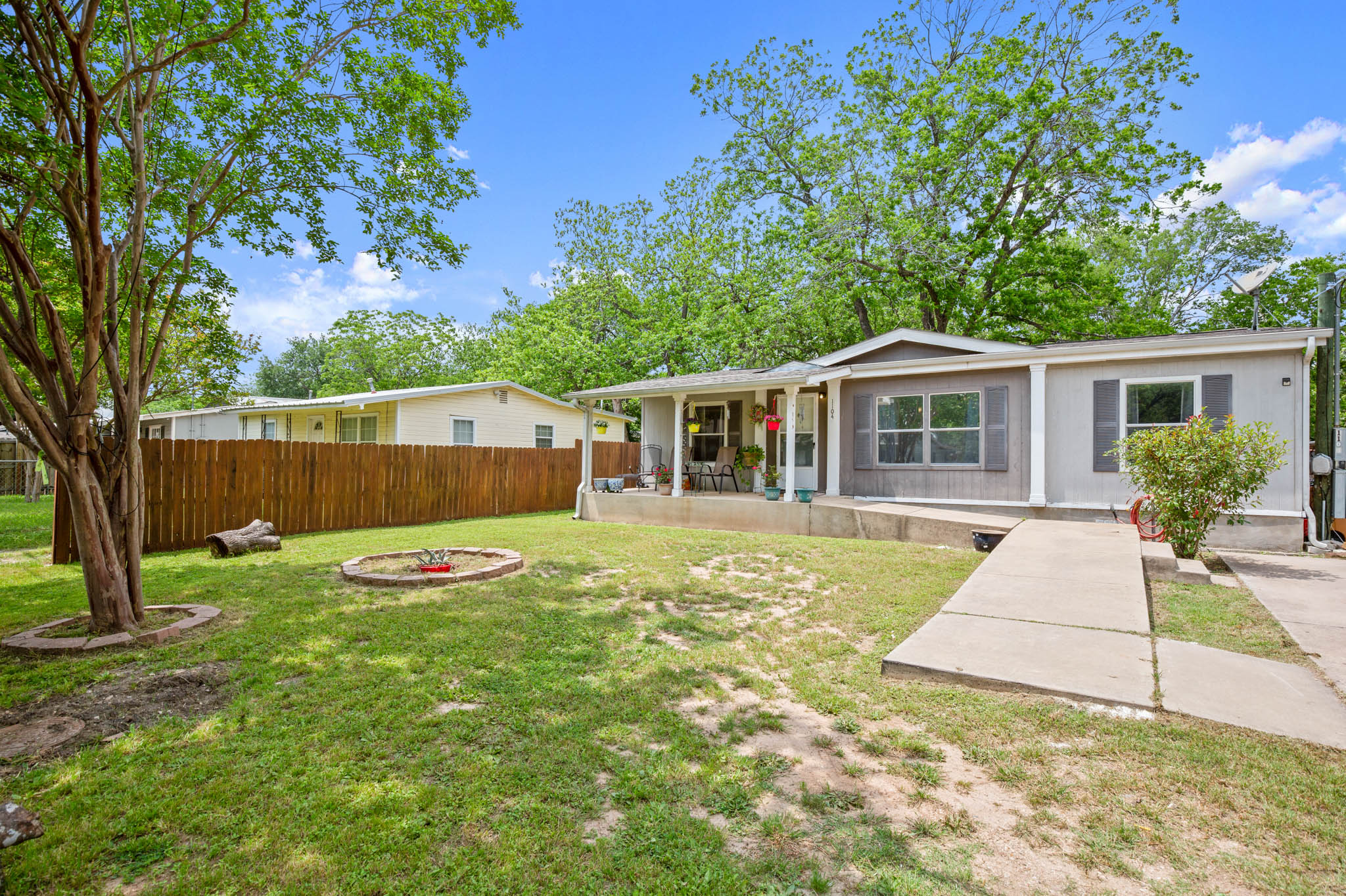 1104 Vasquez Street Austin, TX 78741 - Photo 2 of 18 a view of a house with backyard and sitting area