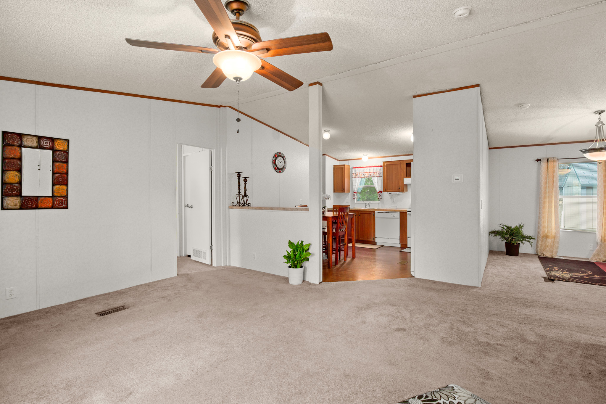1104 Vasquez Street Austin, TX 78741 - Photo 4 of 18 a view of a livingroom with furniture and a ceiling fan