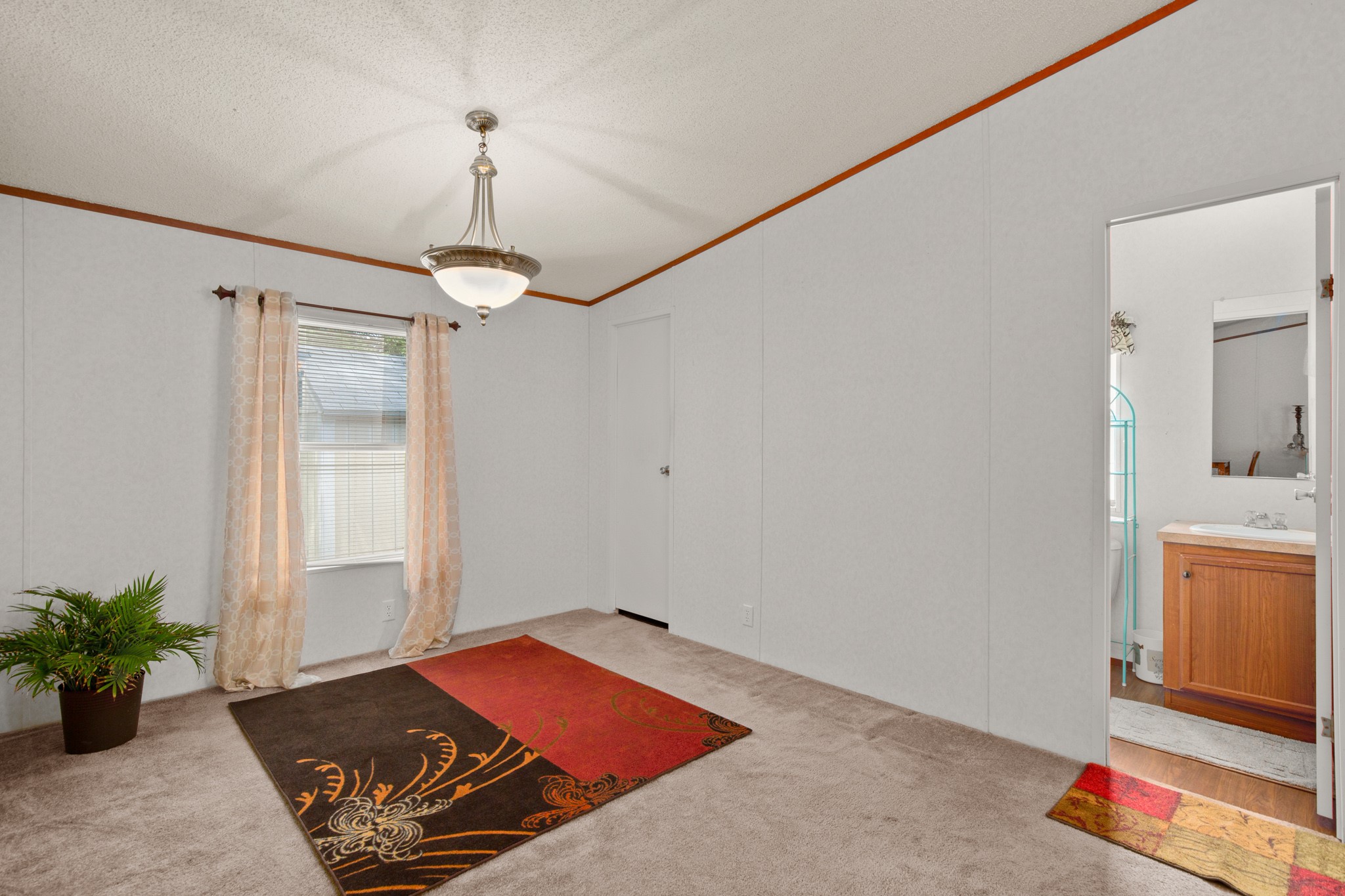 1104 Vasquez Street Austin, TX 78741 - Photo 9 of 18 a room with furniture and window