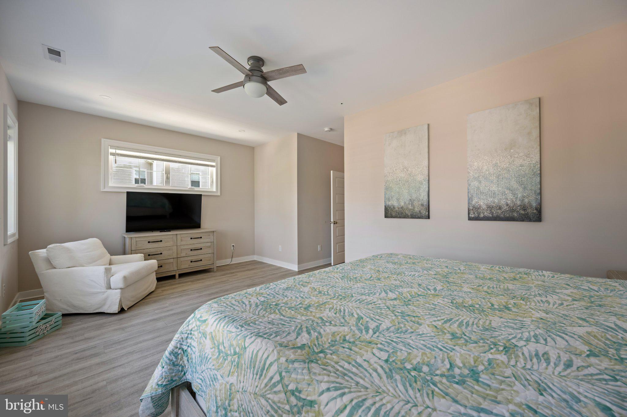 402 Salt Pond Road Bethany Beach, DE 19930 - Photo 25 of 55 Serene bedroom with modern decor.