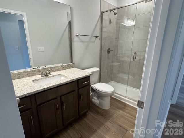 206 Rodeo Drive Shelby, NC 28150 - Photo 4 of 19 a bathroom with a granite countertop sink toilet and shower