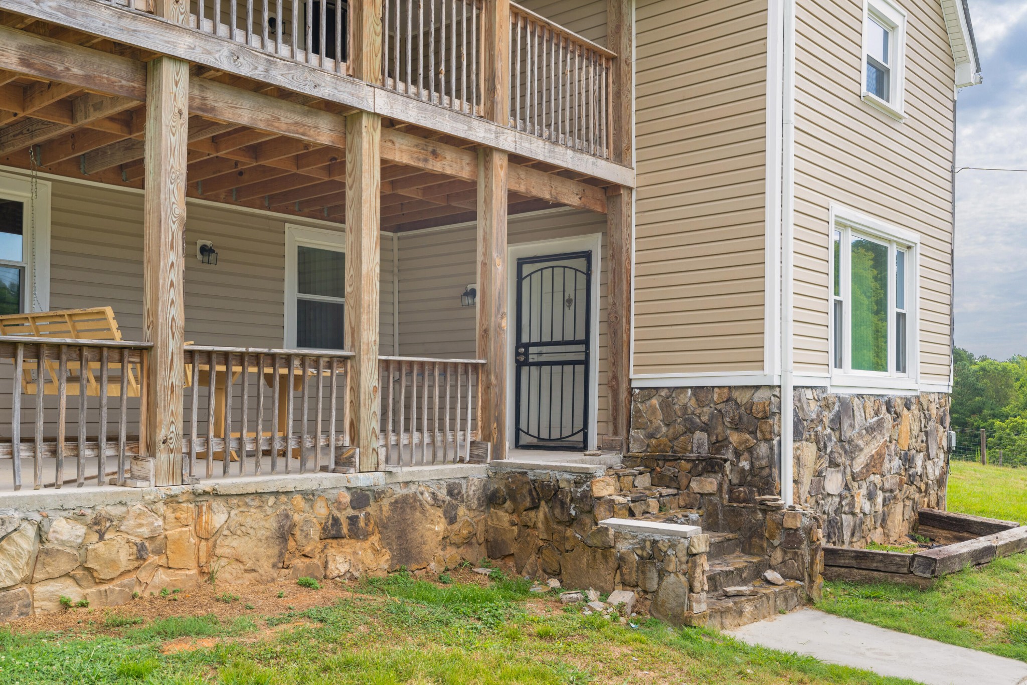930 Kensington Road Chickamauga, GA 30707 - Photo 17 of 82 a view of a house with backyard and sitting area