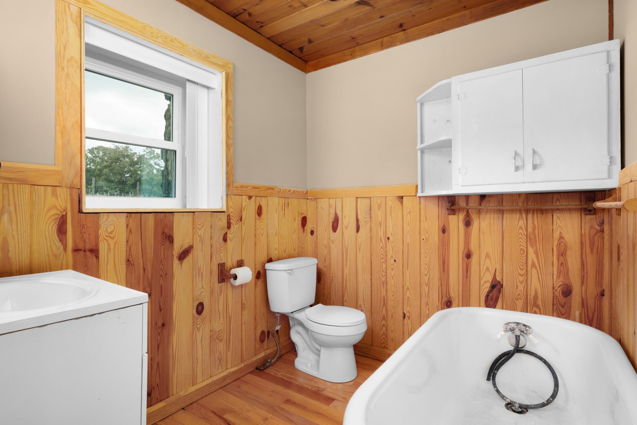 930 Kensington Road Chickamauga, GA 30707 - Photo 26 of 82 a bathroom with a toilet a sink and a window