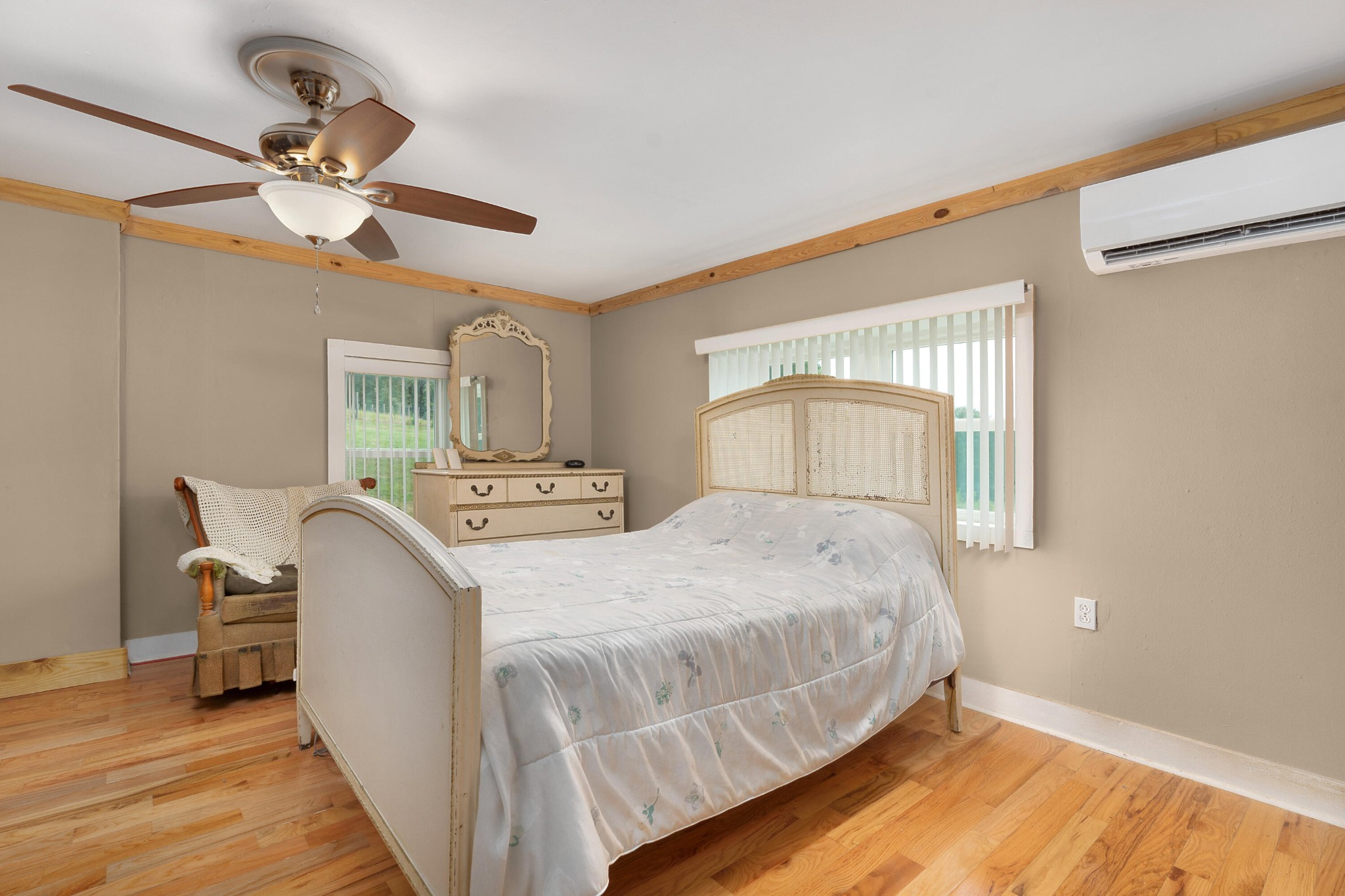 930 Kensington Road Chickamauga, GA 30707 - Photo 32 of 82 a bedroom with a bed and a chandelier