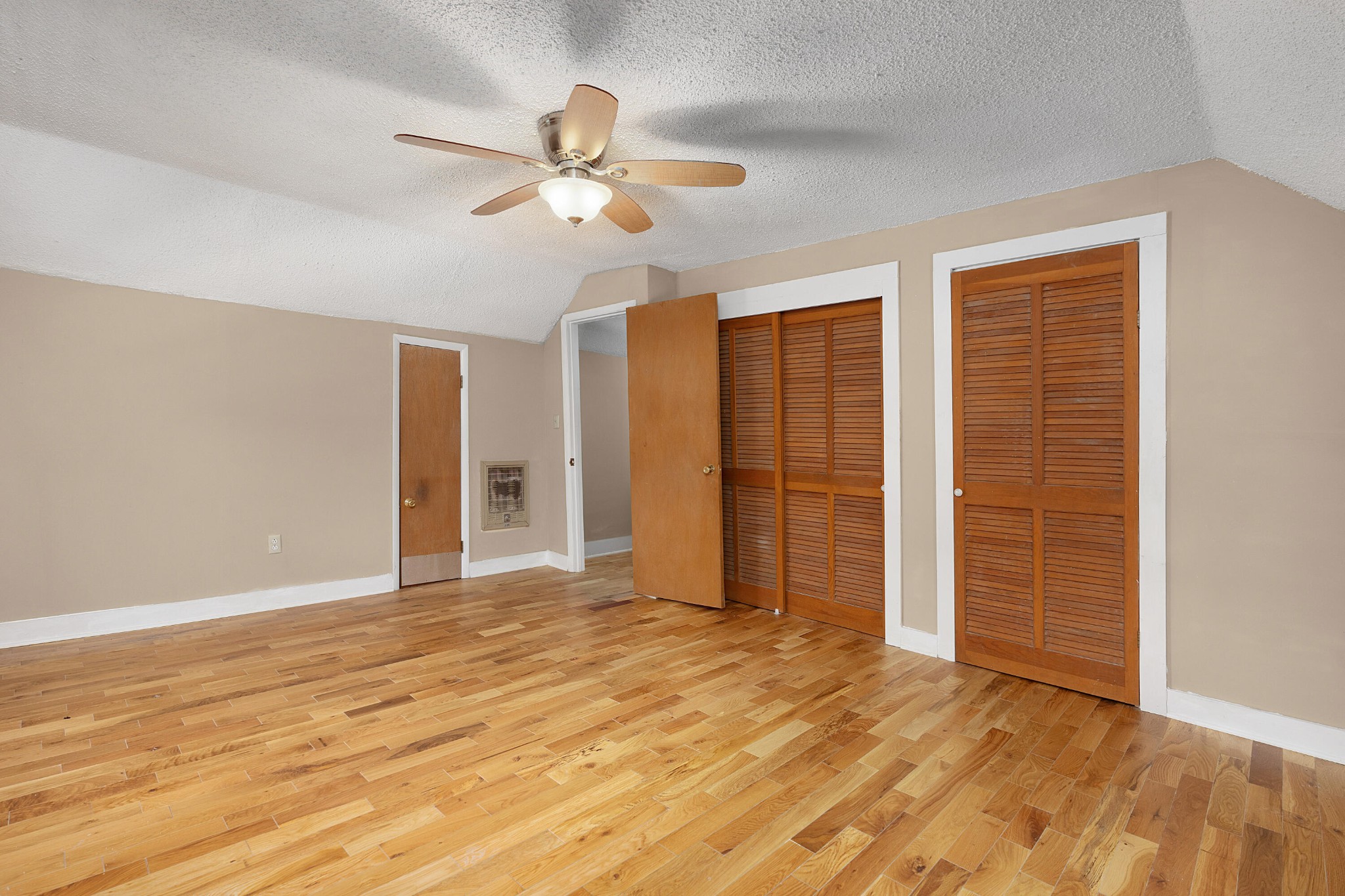 930 Kensington Road Chickamauga, GA 30707 - Photo 36 of 82 a view of an empty room with wooden floor ceiling fan