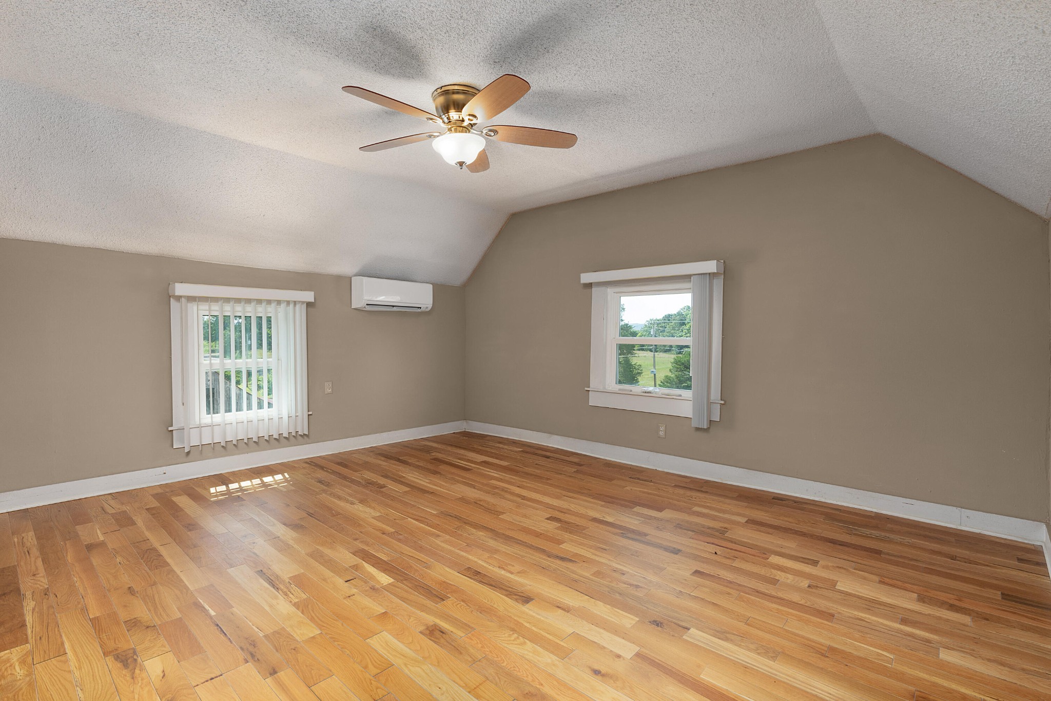 930 Kensington Road Chickamauga, GA 30707 - Photo 39 of 82 a view of an empty room with window and chandelier fan