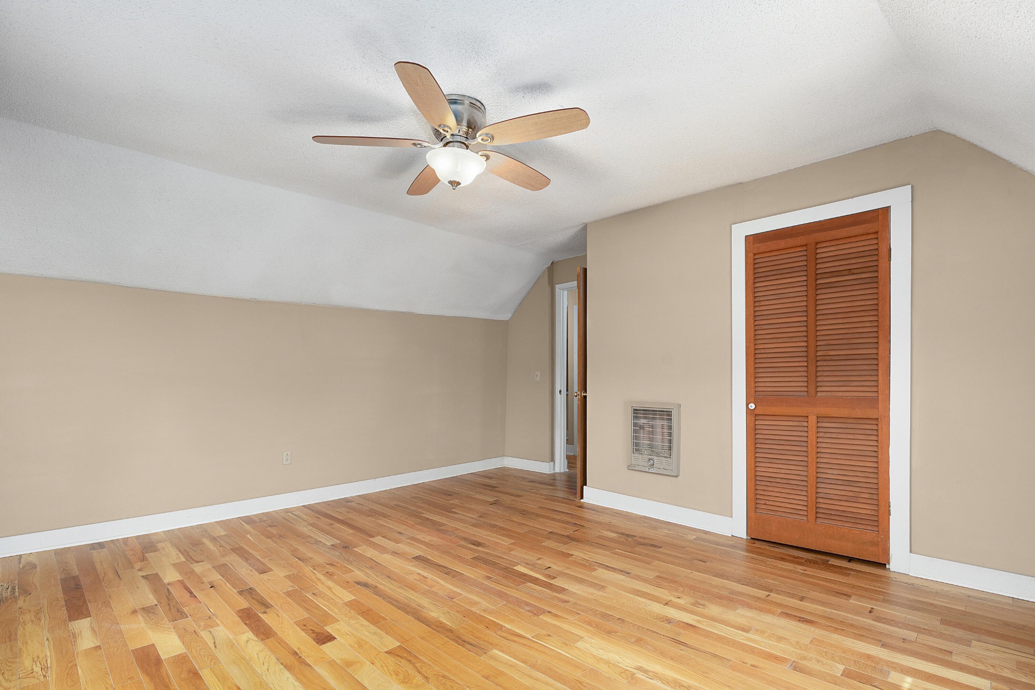 930 Kensington Road Chickamauga, GA 30707 - Photo 40 of 82 a view of empty room with wooden floor and fan