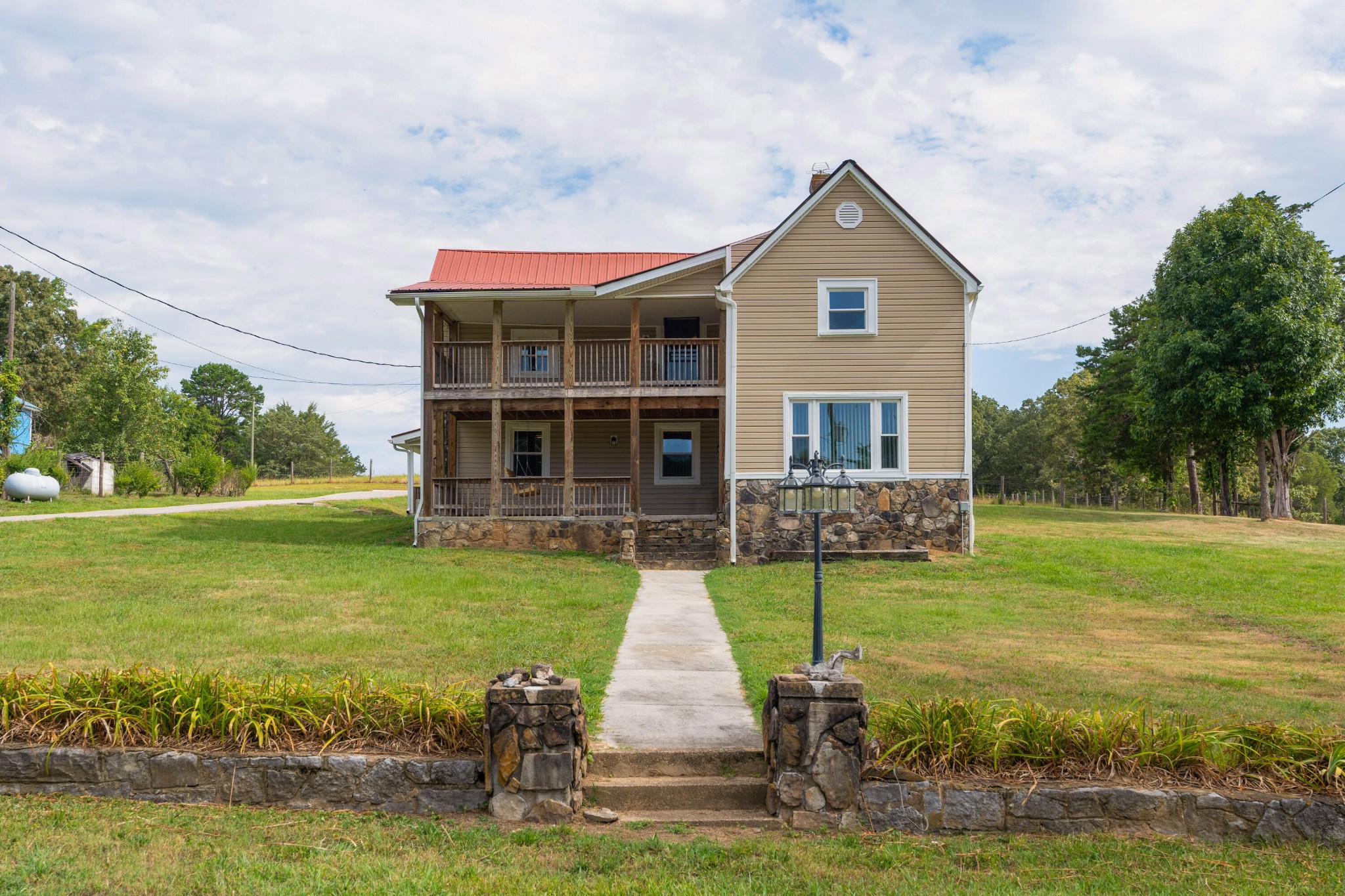 930 Kensington Road Chickamauga, GA 30707 - Photo 7 of 82 a front view of a house with garden