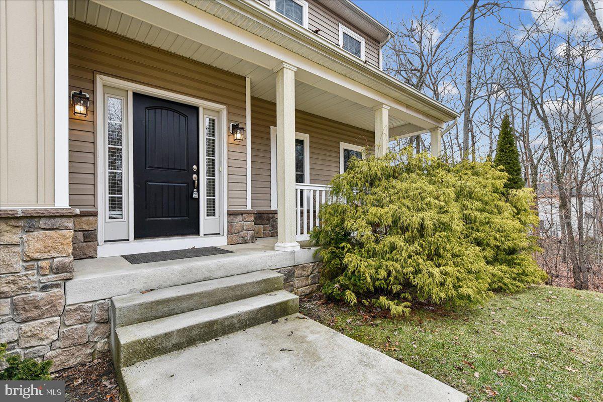 7526 Gilley Terrace Rosedale, MD 21237 - Photo 2 of 43 a view of a house with a small garden