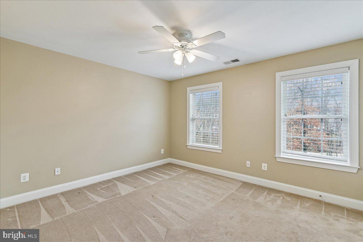 7526 Gilley Terrace Rosedale, MD 21237 - Photo 28 of 43 a view of an empty room with a window