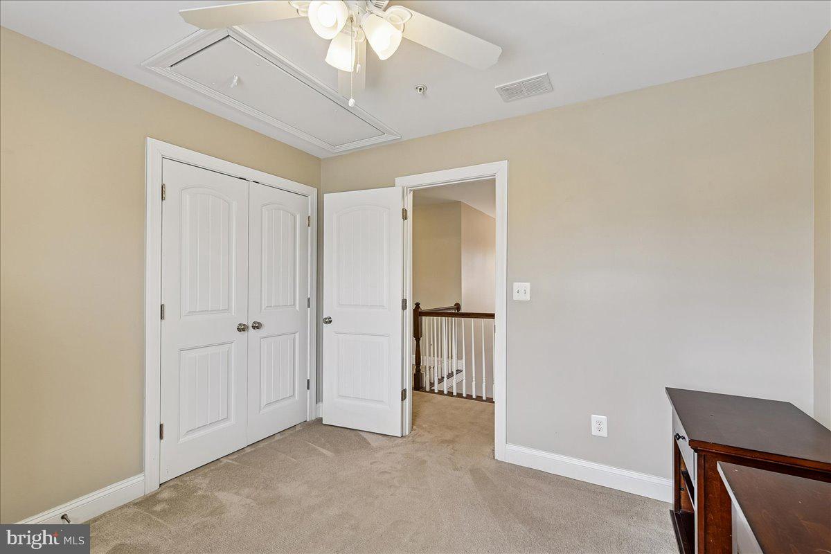 7526 Gilley Terrace Rosedale, MD 21237 - Photo 34 of 43 wooden floor in an empty room