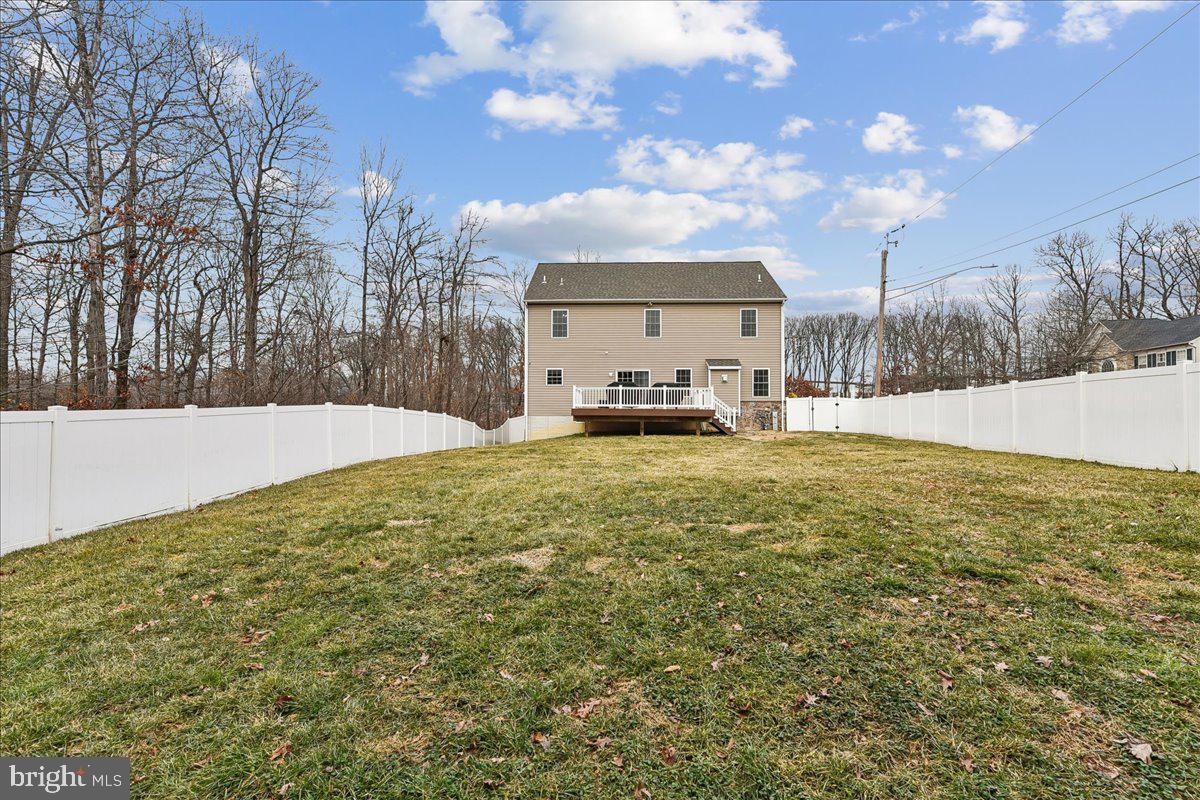 7526 Gilley Terrace Rosedale, MD 21237 - Photo 5 of 43 a view of an house with backyard and trees