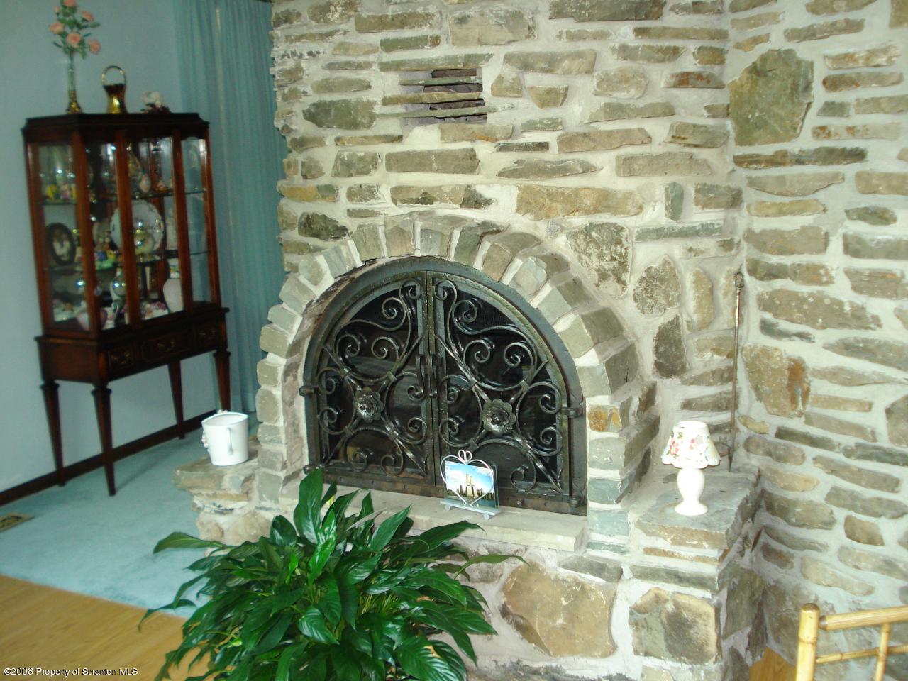 72 Memory Lane Moscow, PA 18444 - Photo 15 of 34 a close view of a fireplace in a bathroom