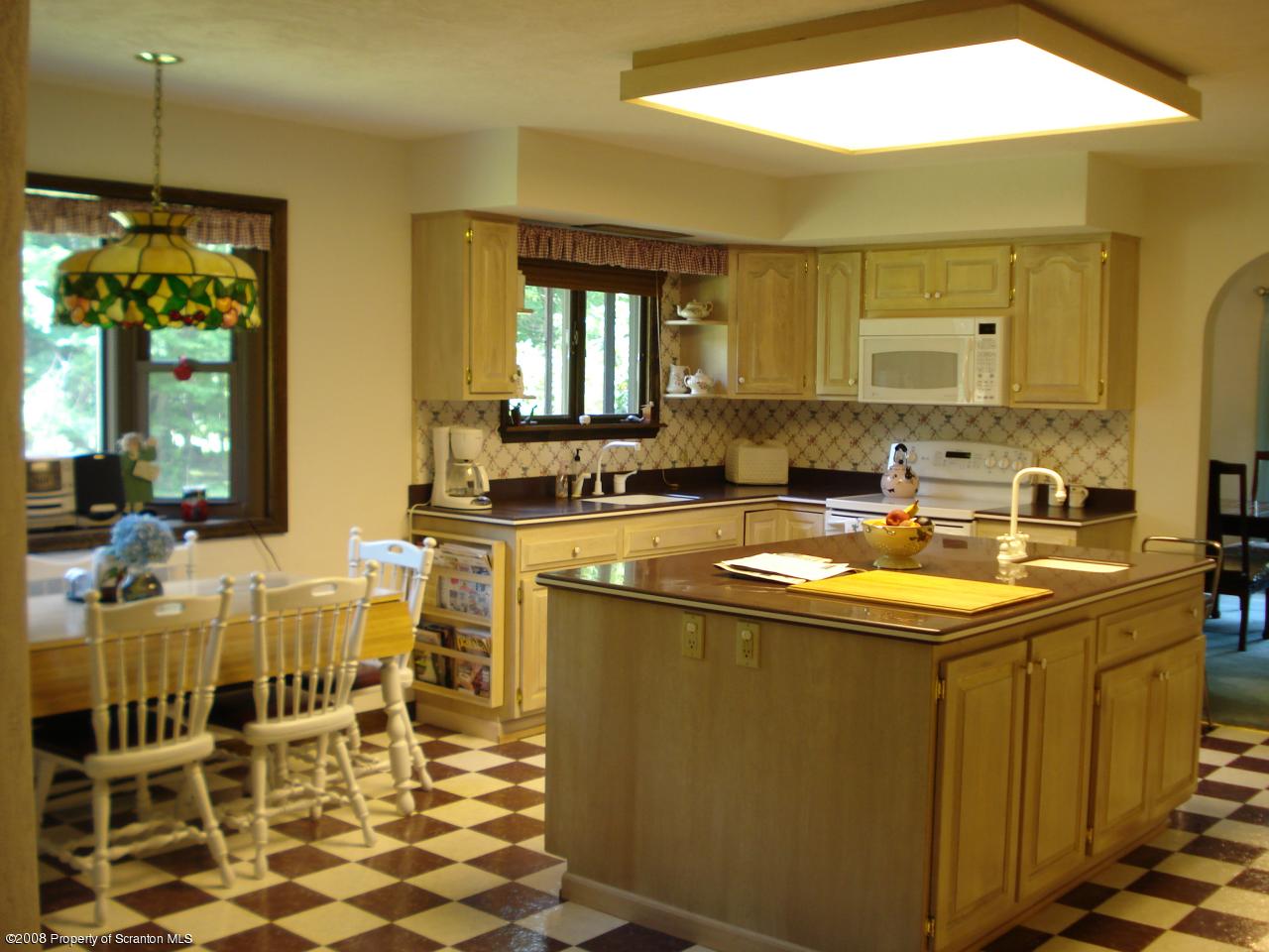72 Memory Lane Moscow, PA 18444 - Photo 18 of 34 a kitchen with a sink and cabinets