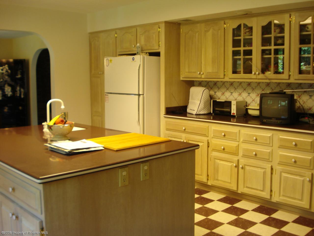 72 Memory Lane Moscow, PA 18444 - Photo 19 of 34 a kitchen with stainless steel appliances granite countertop a sink stove and refrigerator