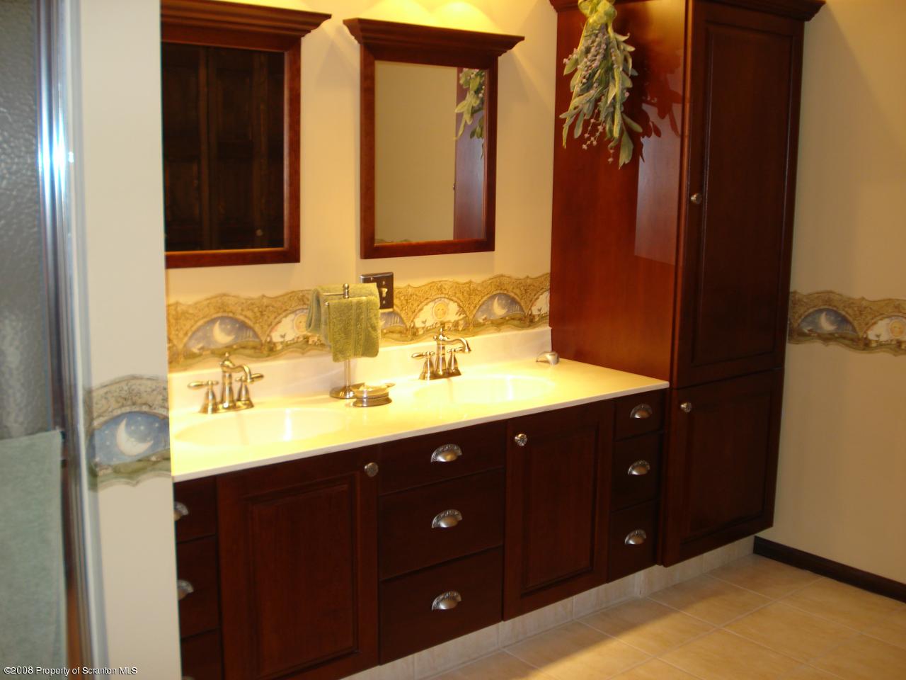 72 Memory Lane Moscow, PA 18444 - Photo 26 of 34 a bathroom with a sink vanity and a mirror
