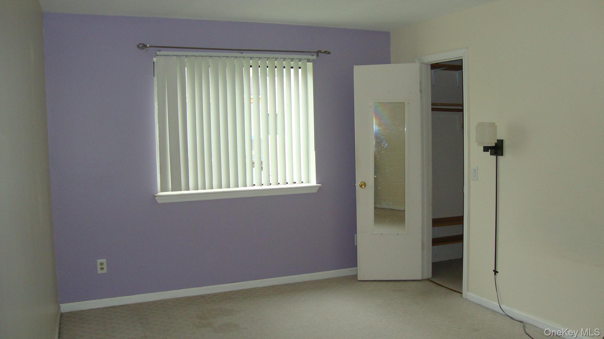 276 Temple Hill Road, Unit 2215 New Windsor, NY 12553 - Photo 11 of 16 an empty room with a window