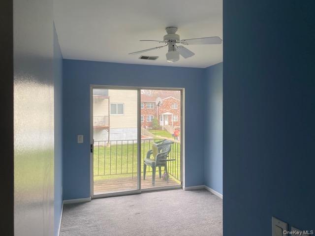 276 Temple Hill Road, Unit 2215 New Windsor, NY 12553 - Photo 13 of 16 a view of an empty room with a window