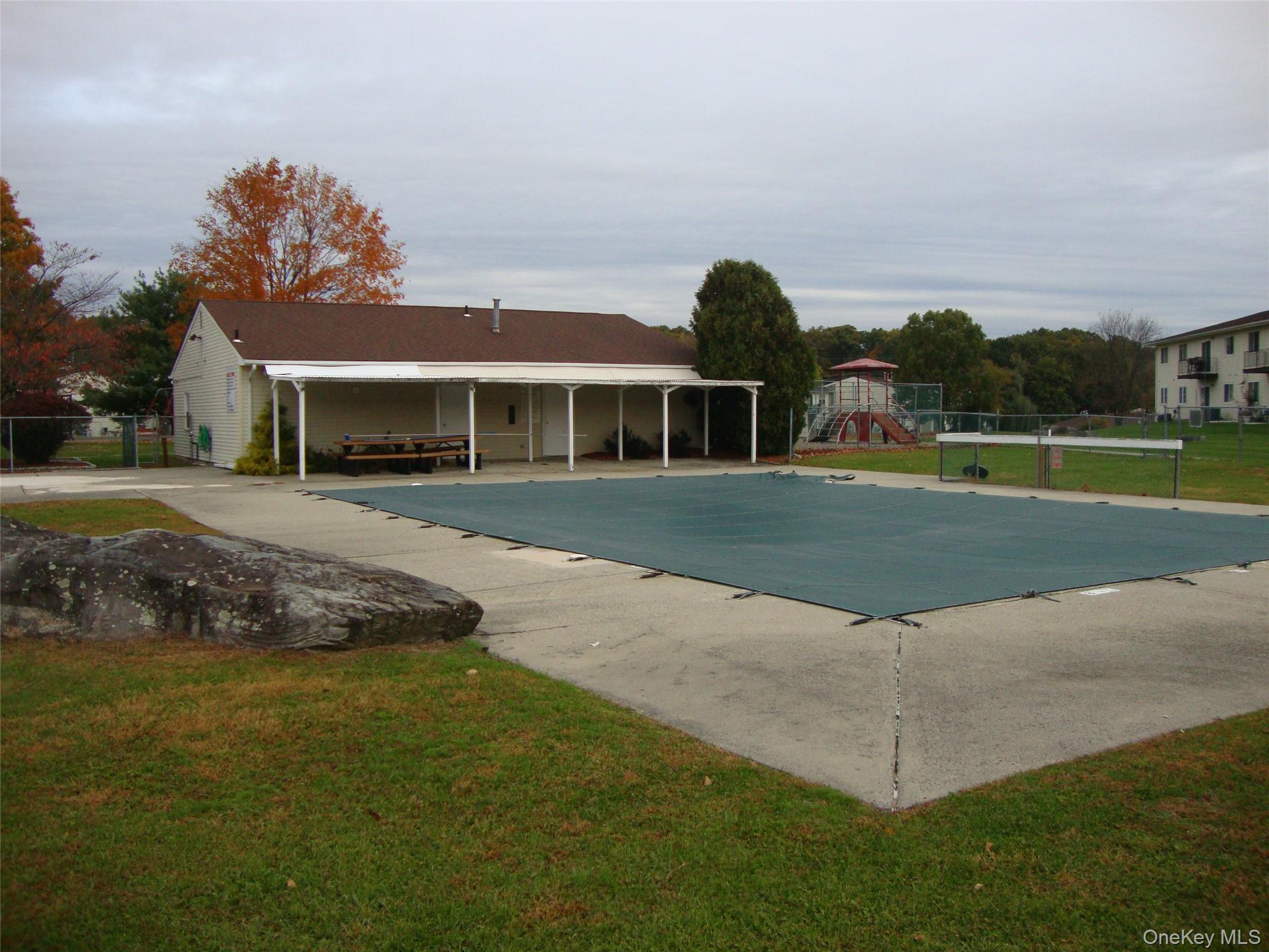 276 Temple Hill Road, Unit 2215 New Windsor, NY 12553 - Photo 16 of 16 a front view of a house with a yard