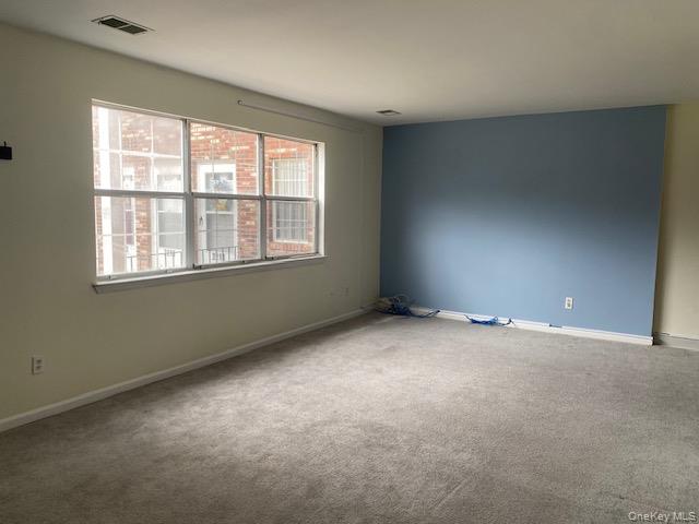 276 Temple Hill Road, Unit 2215 New Windsor, NY 12553 - Photo 3 of 16 an empty room with a window