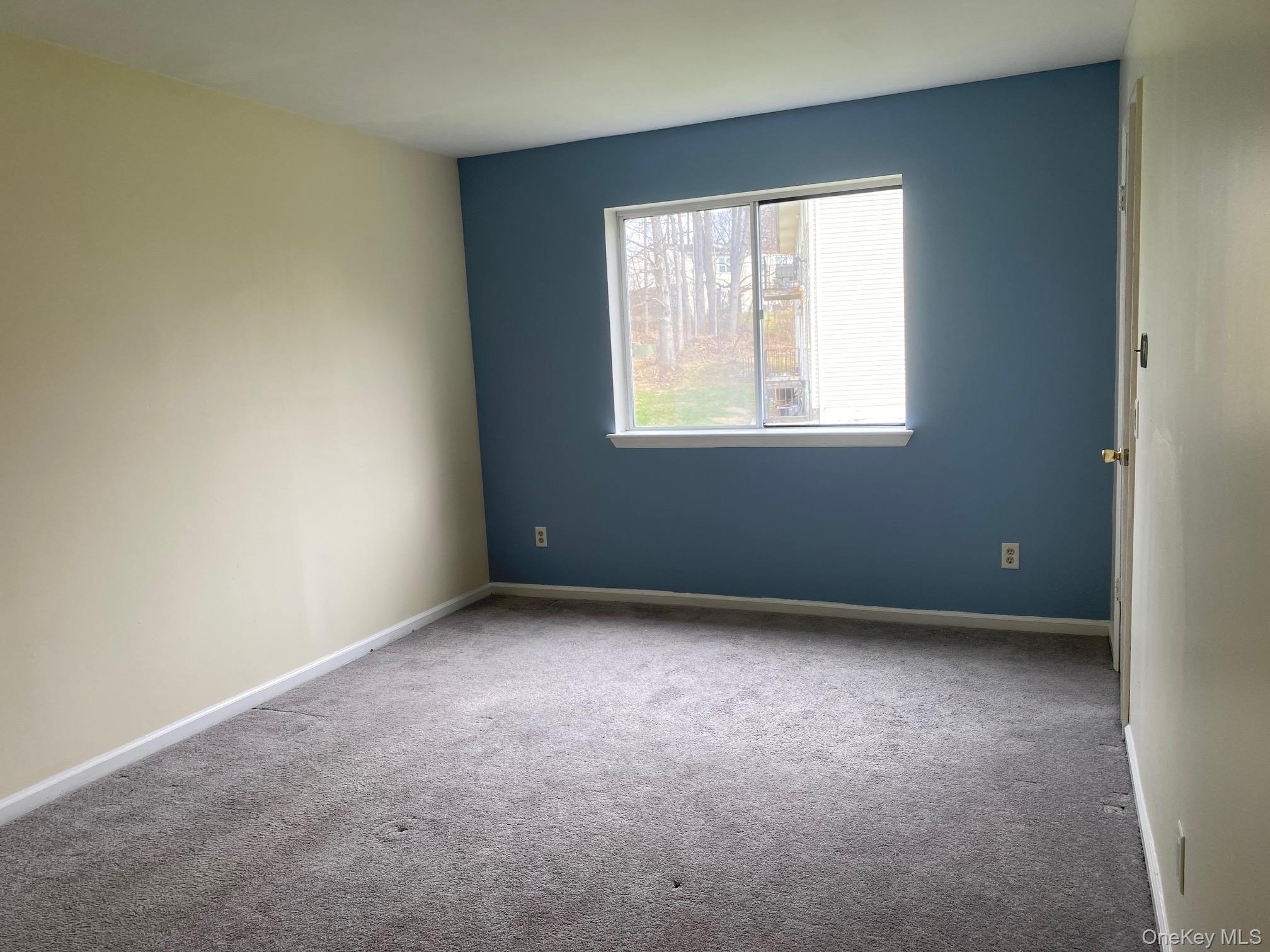 276 Temple Hill Road, Unit 2215 New Windsor, NY 12553 - Photo 9 of 16 an empty room with a window
