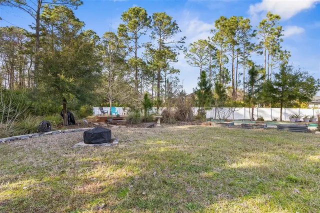 a view of swimming pool with a sitting area