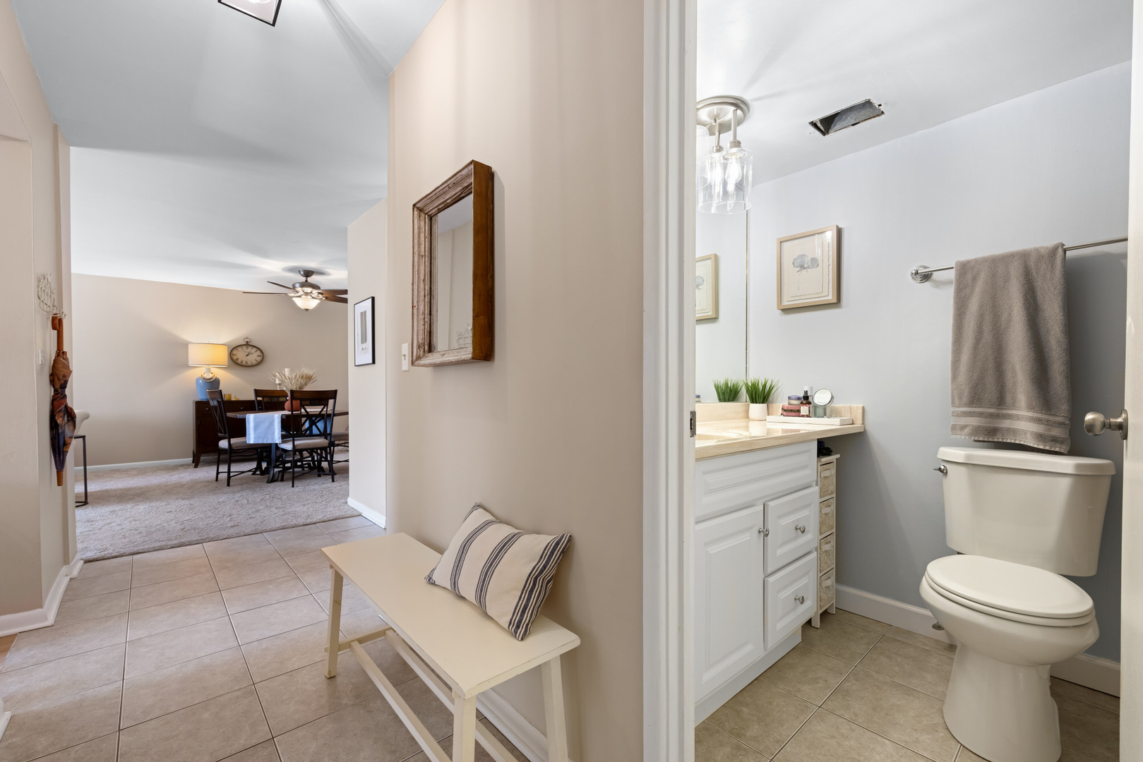 1311 South Finley Road, Unit 205 Lombard, IL 60148 - Photo 11 of 26 a bathroom with a toilet sink and tub