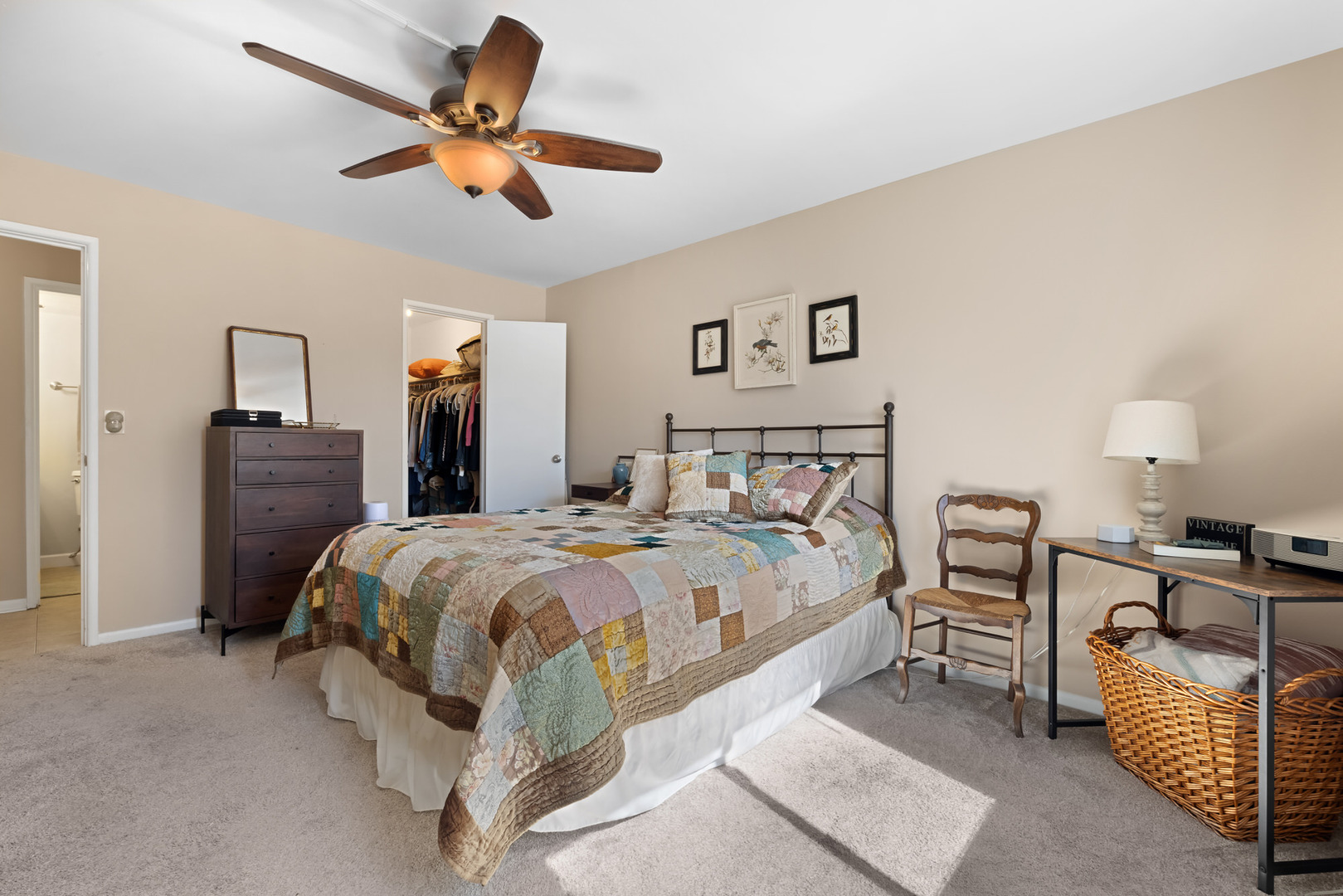 1311 South Finley Road, Unit 205 Lombard, IL 60148 - Photo 14 of 26 a bedroom with a bed and a chandelier