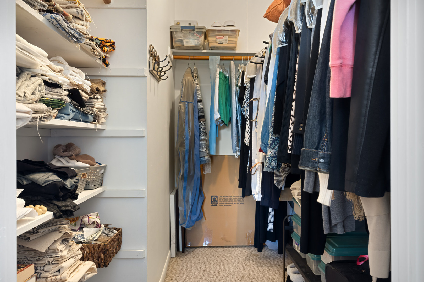 1311 South Finley Road, Unit 205 Lombard, IL 60148 - Photo 15 of 26 a view of walk in closet with clothes and shoes