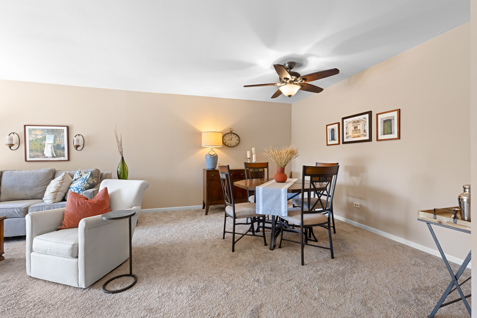 1311 South Finley Road, Unit 205 Lombard, IL 60148 - Photo 2 of 26 a work room with furniture and a ceiling fan