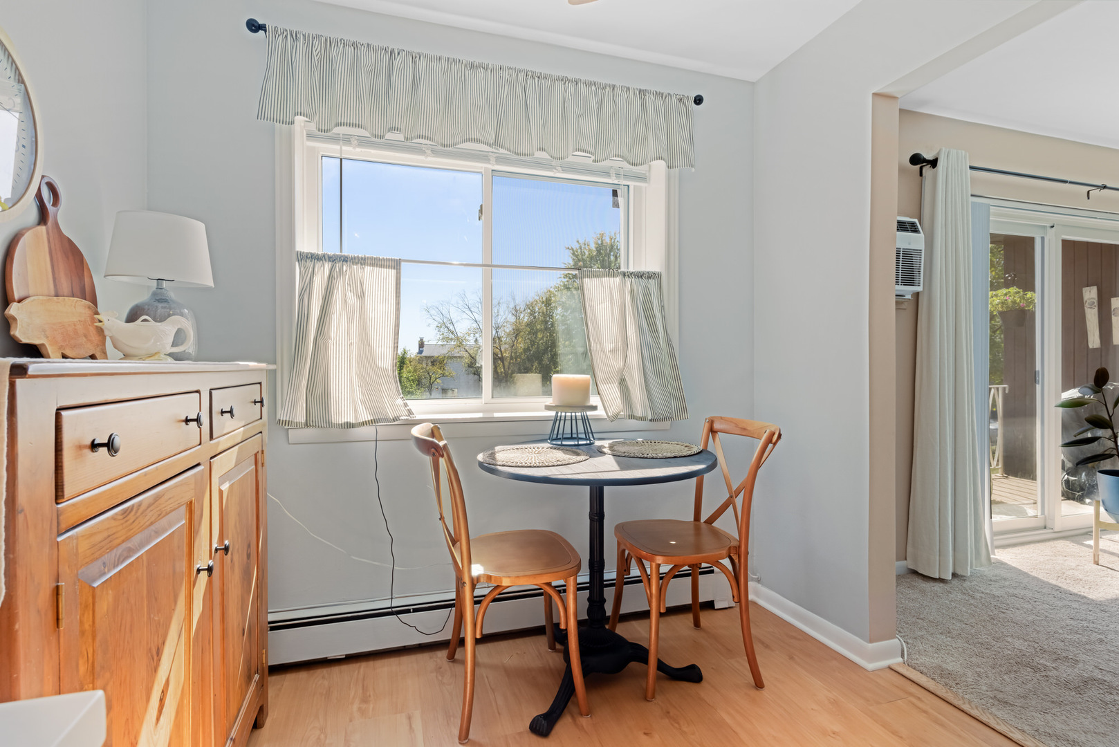 1311 South Finley Road, Unit 205 Lombard, IL 60148 - Photo 9 of 26 a dining room with furniture and window