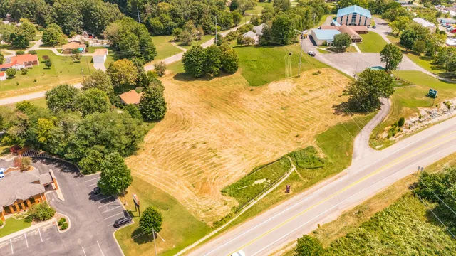 a view of swimming pool with a yard