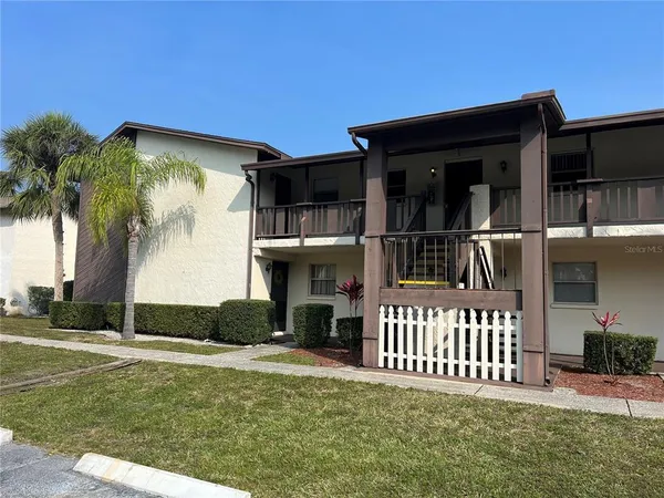 a front view of a house having yard