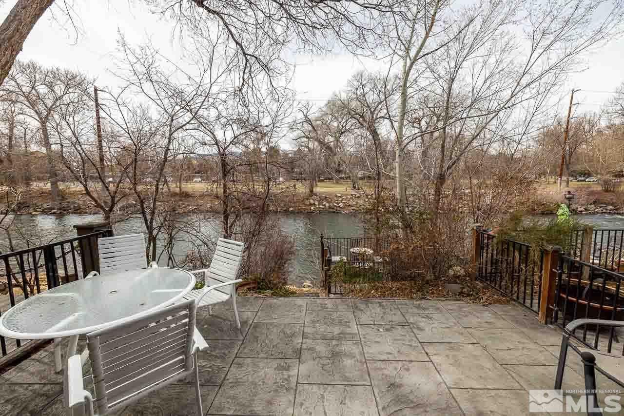 1310 Jones Street Reno, NV 89503 - Photo 7 of 9 a backyard of a house with table and chairs