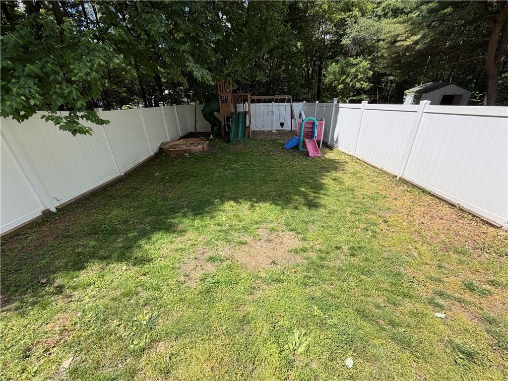 60 Sassafras Road Lehighton, PA 18235 - Photo 6 of 36 Secure yard featuring robust fencing and a delightful playset.