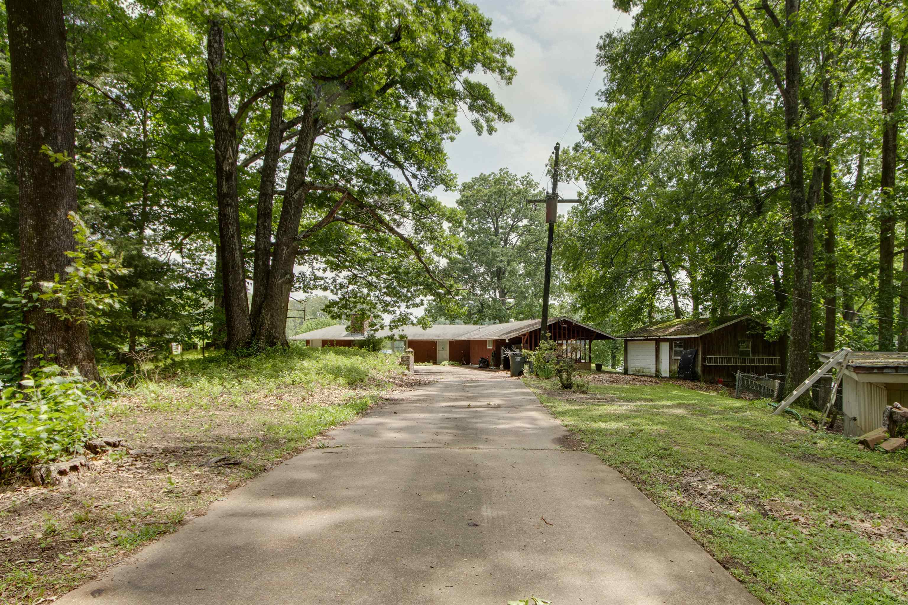 4920 Coro Road Memphis, TN 38109 - Photo 1 of 25 a view of a house with a yard