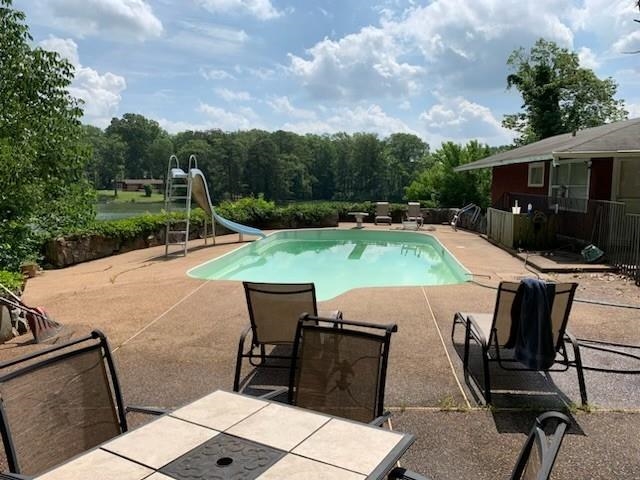 4920 Coro Road Memphis, TN 38109 - Photo 8 of 25 a view of backyard with seating space and trees