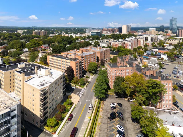 an aerial view of a city with lots of residential buildings