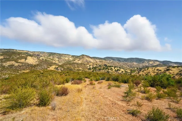 a view of lake and mountain